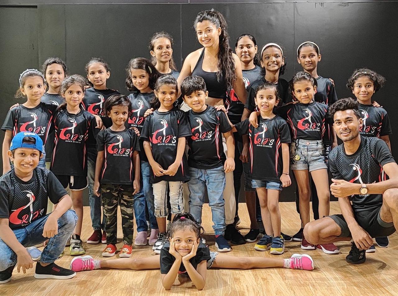 Students learning contemporary dance